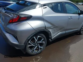2018 Toyota C-HR XLE z VIN NMTKHMBX5JR009504, wystawiony jako IAAI lot #41776136 z przebiegiem 63 795 mil mil oraz . Historia ofert i sprzedaży dostępna na DreamBid. Obrazek 6.