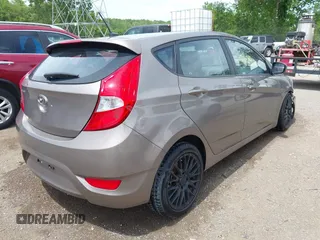2012 Hyundai Accent SE with VIN KMHCU5AE1CU006231, listed as a IAAI auction lot 42263193 with 104,845 mi miles and . Bid and sale history available at DreamBid. Image 4.
