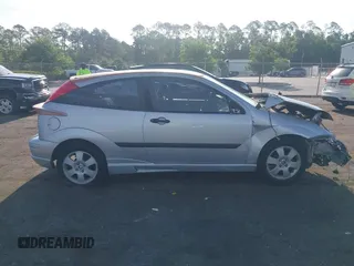 2001 Ford Focus ZX3 with VIN 3FAFP313X1R117916, listed as a IAAI auction lot 42123596 with 88,599 mi miles and . Bid and sale history available at DreamBid. Image 13.