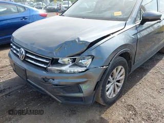 2018 Volkswagen Tiguan S with VIN 3VV0B7AX5JM108306, listed as a IAAI auction lot 42741783 with 71,040 mi miles and . Bid and sale history available at DreamBid. Image 6.