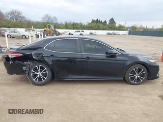 2018 Toyota Camry LE z VIN JTNB11HK6J3005121, wystawiony jako IAAI lot #42065784 z przebiegiem 114 907 mil mil oraz . Historia ofert i sprzedaży dostępna na DreamBid. Obrazek 13.
