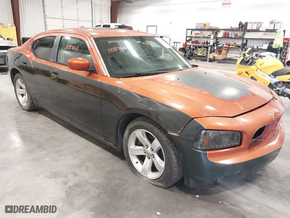 2006 Dodge Charger R/T with VIN 2B3KA53H56H195653, listed as a IAAI auction lot 39254908 with 164,629 mi miles. Bid and sale history available at carsss.com. Image 1.
