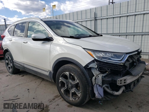 2018 Honda CR-V Touring with VIN 5J6RW2H95JL030237, listed as a Copart auction lot 44001415 with 55,575 mi miles and Salvage Title. Bid and sale history available at DreamBid. Image 4.