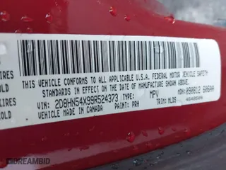 2009 Dodge Grand Caravan SXT with VIN 2D8HN54X99R524373, listed as a IAAI auction lot 41886225 with 124,590 mi miles. Bid and sale history available at carsss.com. Image 9.