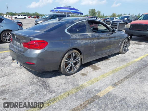 2018 BMW 4 Series 430i with VIN WBA4W3C57JAC97210, listed as a IAAI auction lot 41943772 with 89,232 mi miles and . Bid and sale history available at DreamBid. Image 4.