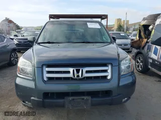 2006 Honda Pilot EX-L with VIN 2HKYF18536H538744, listed as a IAAI auction lot 42025277 with 203,012 mi miles. Bid and sale history available at carsss.com. Image 12.