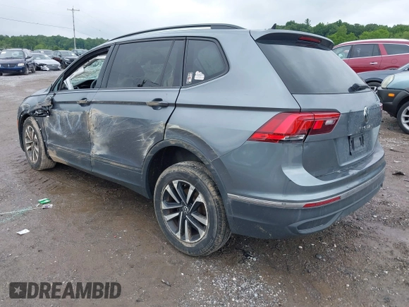 2022 Volkswagen Tiguan S with VIN 3VV1B7AX9NM005125, listed as a IAAI auction lot 42371110 with 94,060 mi miles and . Bid and sale history available at DreamBid. Image 3.