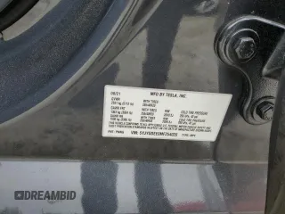 2021 Tesla Model Y Long Range z VIN 5YJYGDEE0MF254020, wystawiony jako Copart lot #51666865 z przebiegiem 25 805 mil mil oraz Szkody całkowita. Historia ofert i sprzedaży dostępna na DreamBid. Obrazek 14.