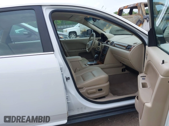 2006 Ford Five Hundred SEL with VIN 1FAFP24166G164248, listed as a IAAI auction lot 42166430 with 122,079 mi miles and . Bid and sale history available at DreamBid. Image 5.
