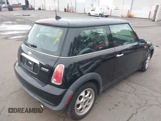2005 MINI Hardtop with VIN WMWRC33535TJ70850, listed as a IAAI auction lot 42219720 with 66,398 mi miles and . Bid and sale history available at DreamBid. Image 4.