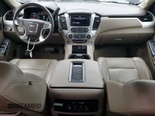 2017 GMC Yukon XL SLT with VIN 1GKS1GKC5HR332484, listed as a Copart auction lot 51957095 with 188,204 mi miles and Salvage Title. Bid and sale history available at DreamBid. Image 8.