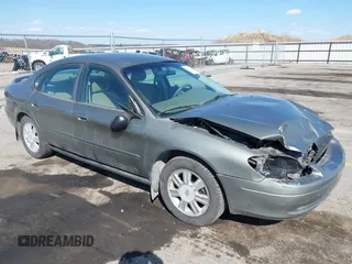2003 Ford Taurus SES Standard with VIN 1FAFP55283G168564, listed as a IAAI auction lot 41884130 with 199,923 mi miles and . Bid and sale history available at DreamBid. Image 1.
