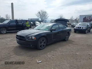 2014 Dodge Charger SXT Plus with VIN 2C3CDXJG2EH184239, listed as a IAAI auction lot 41912384 with 128,313 mi miles. Bid and sale history available at carsss.com. Image 18.