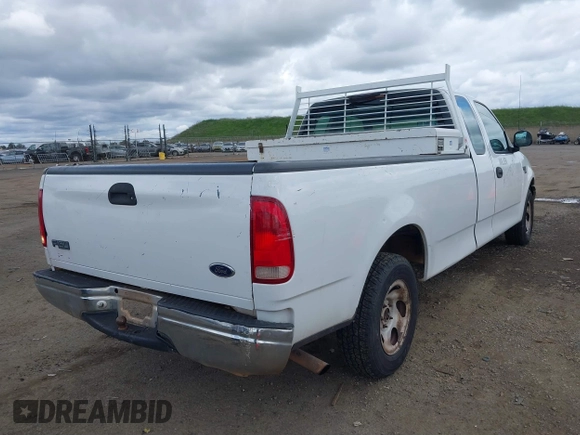 2000 Ford F-150 XL with VIN 1FTRX17W5YKB03384, listed as a IAAI auction lot 41723526 with 281,658 mi miles. Bid and sale history available at carsss.com. Image 4.