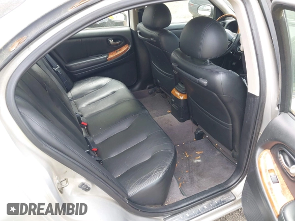 2002 Infiniti I35 Luxury z VIN JNKDA31A02T023642, wystawiony jako IAAI lot #42096567 z przebiegiem 94 412 mil mil oraz . Historia ofert i sprzedaży dostępna na DreamBid. Obrazek 8.