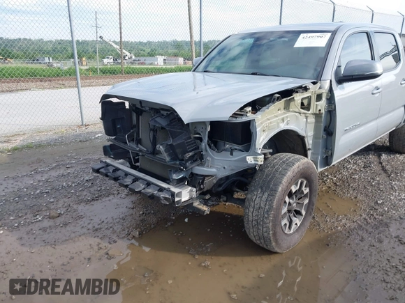 2021 Toyota Tacoma SR with VIN 5TFCZ5AN7MX255512, listed as a IAAI auction lot 42497907 with 50,563 mi miles and . Bid and sale history available at DreamBid. Image 6.