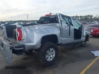 2016 GMC Canyon 2WD SLE with VIN 1GTG5CE34G1252553, listed as a IAAI auction lot 41609585 with 128,720 mi miles. Bid and sale history available at carsss.com. Image 4.