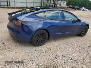 2021 Tesla Model 3 Long Range z VIN 5YJ3E1EB7MF906605, wystawiony jako Copart lot #55214665 z przebiegiem 101 182 mil mil oraz Szkoda całkowita • Salvage title. Historia ofert i sprzedaży dostępna na DreamBid. Obrazek 3.