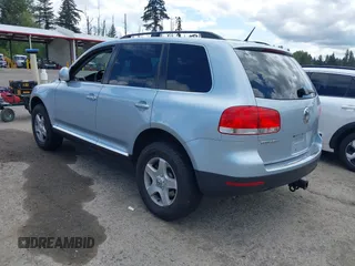 2007 Volkswagen Touareg V6 z VIN WVGZE77L37D001840, wystawiony jako IAAI lot #42323795 z przebiegiem 176 486 mil mil oraz . Historia ofert i sprzedaży dostępna na DreamBid. Obrazek 3.