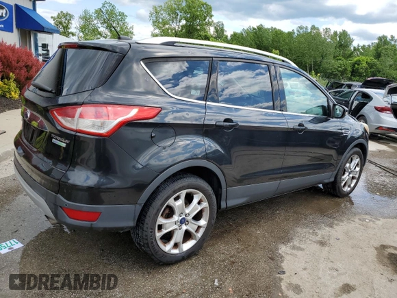 2015 Ford Escape Titanium with VIN 1FMCU0JX5FUA24210, listed as a Copart auction lot 57270855 with 115,613 mi miles and Salvage title. Bid and sale history available at DreamBid. Image 3.