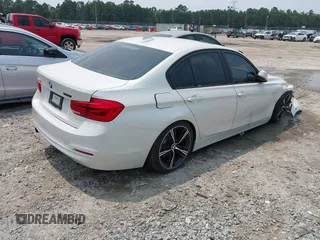 2016 BMW 3 Series 328i with VIN WBA8E9G54GNU29808, listed as a IAAI auction lot 42389903 with 76,138 mi miles and . Bid and sale history available at DreamBid. Image 4.