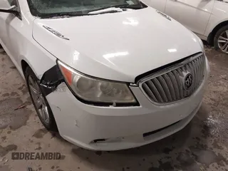 2010 Buick LaCrosse CXL z VIN 1G4GD5EG3AF165301, wystawiony jako IAAI lot #41002449 z przebiegiem 202 659 mil mil oraz . Historia ofert i sprzedaży dostępna na DreamBid. Obrazek 6.