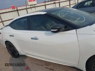 2016 Nissan Maxima SV with VIN 1N4AA6AP4GC421749, listed as a IAAI auction lot 42318579 with 120,669 mi miles and . Bid and sale history available at DreamBid. Image 12.