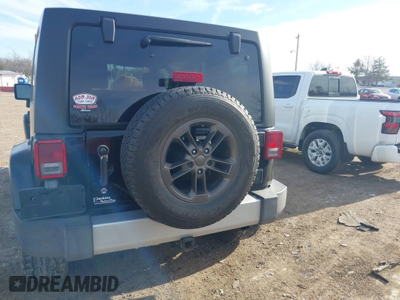 2008 Jeep Wrangler Unlimited Sahara with VIN 1J4GB59118L522013, listed as a IAAI auction lot 41644487 with 227,176 mi miles and . Bid and sale history available at DreamBid. Image 16.