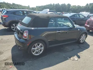 2013 MINI Convertible z VIN WMWZN3C54DT568237, wystawiony jako Copart lot #72354594 z przebiegiem 141 058 mil mil oraz Szkoda całkowita • Salvage title. Historia ofert i sprzedaży dostępna na DreamBid. Obrazek 3.