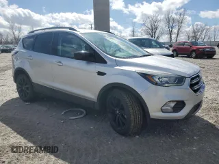 2017 Ford Escape SE with VIN 1FMCU9GD2HUC63427, listed as a Copart auction lot 50571535 with 102,911 mi miles and Salvage Title. Bid and sale history available at carsss.com. Image 4.