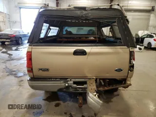 1999 Ford F-150 z VIN 1FTRF18W5XKB44503, wystawiony jako Copart lot #82359574 z przebiegiem 272 265 mil mil oraz Szkoda całkowita • Salvage title. Historia ofert i sprzedaży dostępna na DreamBid. Obrazek 6.