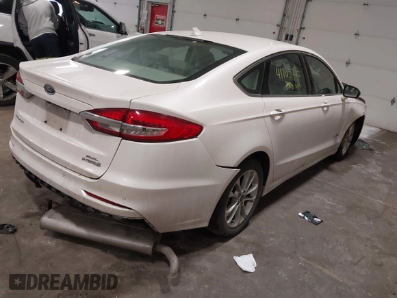 2019 Ford Fusion Hybrid SEL with VIN 3FA6P0MU8KR272811, listed as a IAAI auction lot 41705282 with 56,565 mi miles. Bid and sale history available at carsss.com. Image 4.