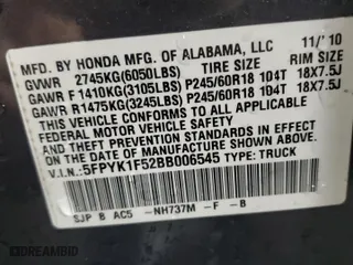 2011 Honda Ridgeline RTL with VIN 5FPYK1F52BB006545, listed as a Copart auction lot 50235045 with 207,050 mi miles and Salvage Title. Bid and sale history available at carsss.com. Image 12.