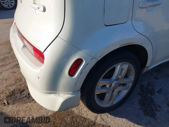 2009 Nissan Cube SL z VIN JN8AZ28R19T106532, wystawiony jako IAAI lot #40675288 z przebiegiem Nie podano mil oraz . Historia ofert i sprzedaży dostępna na DreamBid. Obrazek 12.