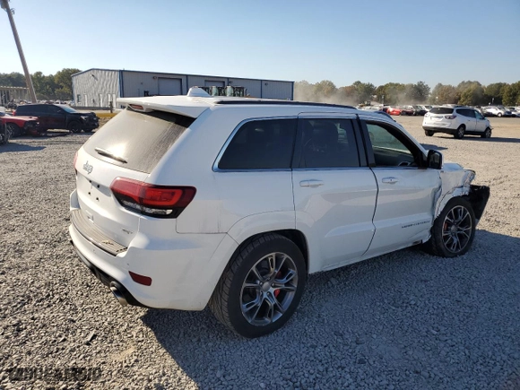 2015 Jeep Grand Cherokee SRT with VIN 1C4RJFDJ4FC625552, listed as a Copart auction lot 77171974 with 114,932 mi miles and Clean Title. Bid and sale history available at carsss.com. Image 3.