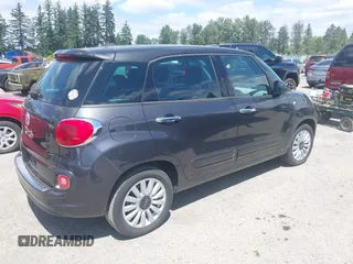 2014 FIAT 500L Easy with VIN ZFBCFABH0EZ028102, listed as a IAAI auction lot 42721149 with 115,137 mi miles and . Bid and sale history available at DreamBid. Image 4.