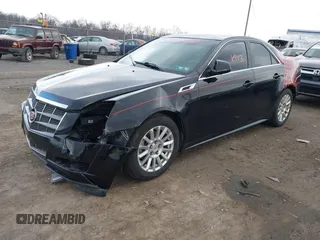 2011 Cadillac CTS z VIN 1G6DC5EY1B0156347, wystawiony jako IAAI lot #41496903 z przebiegiem 128 304 mil mil oraz . Historia ofert i sprzedaży dostępna na DreamBid. Obrazek 2.