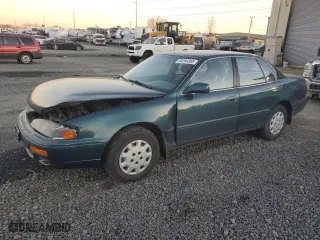 1996 Toyota Camry DX with VIN JT2BG12K2T0400938, listed as a Copart auction lot 42264365 with 98,349 mi miles and Salvage Title. Bid and sale history available at carsss.com. Image 1.