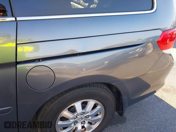 2010 Honda Odyssey EX-L with VIN 5FNRL3H76AB010388, listed as a IAAI auction lot 41678322 with 197,826 mi miles and . Bid and sale history available at carsss.com. Image 6.