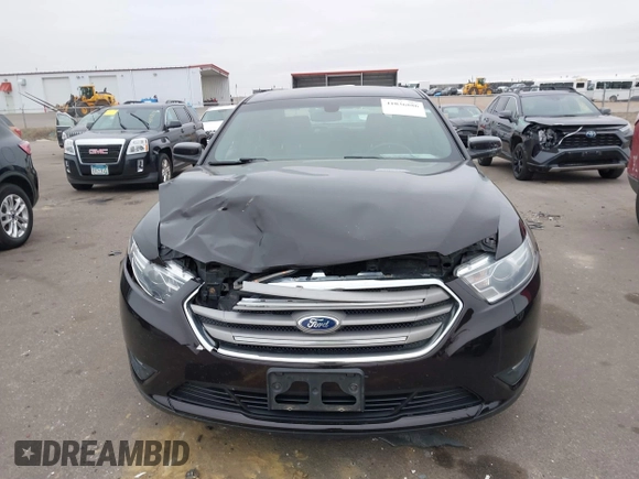 2014 Ford Taurus SEL z VIN 1FAHP2E85EG121636, wystawiony jako IAAI lot #41036886 z przebiegiem 117 460 mil mil oraz . Historia ofert i sprzedaży dostępna na DreamBid. Obrazek 12.