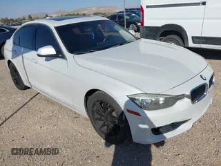 2015 BMW 3 Series 328i with VIN WBA3A5G59FNP34329, listed as a IAAI auction lot 42042250 with 126,955 mi miles. Bid and sale history available at carsss.com. Image 1.