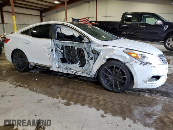 2013 Hyundai Azera z VIN KMHFH4JG0DA225049, wystawiony jako Copart lot #65530604 z przebiegiem 77 218 mil mil oraz Szkoda całkowita • Salvage title. Historia ofert i sprzedaży dostępna na DreamBid. Obrazek 4.
