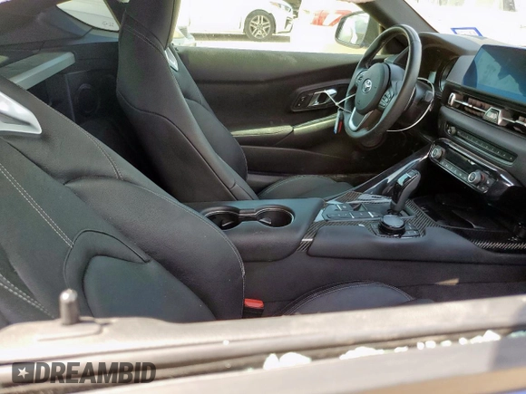 2023 Toyota Supra 3.0 with VIN WZ1DB0G05PW054758, listed as a Copart auction lot 60202015 with 32,974 mi miles and Salvage title. Bid and sale history available at DreamBid. Image 10.