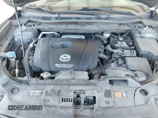 2016 Mazda CX-5 Sport with VIN JM3KE4BY1G0910102, listed as a IAAI auction lot 42115163 with 144,495 mi miles and . Bid and sale history available at carsss.com. Image 10.