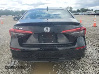2023 Honda Civic Sport with VIN 2HGFE2F56PH570926, listed as a Copart auction lot 61419145 with 35,014 mi miles and Salvage title. Bid and sale history available at DreamBid. Image 6.