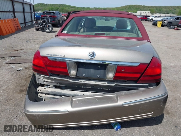 2004 Mercury Grand Marquis LS Premium z VIN 2MEFM75W34X674542, wystawiony jako IAAI lot #42018186 z przebiegiem 137 944 mil mil oraz . Historia ofert i sprzedaży dostępna na DreamBid. Obrazek 17.