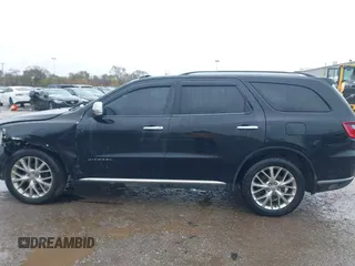 2014 Dodge Durango Citadel with VIN 1C4RDJEG5EC466164, listed as a IAAI auction lot 40936279 with 259,102 mi miles and . Bid and sale history available at DreamBid. Image 14.