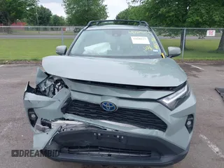 2023 Toyota RAV4 Hybrid XLE Premium z VIN 4T3B6RFV0PU132809, wystawiony jako IAAI lot #42646117 z przebiegiem 43 083 mil mil oraz . Historia ofert i sprzedaży dostępna na DreamBid. Obrazek 12.