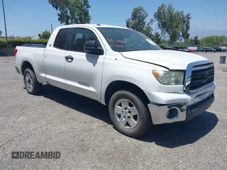 2012 Toyota Tundra z VIN 5TFRM5F17CX039933, wystawiony jako IAAI lot #42158915 z przebiegiem 146 079 mil mil oraz . Historia ofert i sprzedaży dostępna na DreamBid. Obrazek 1.