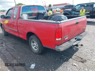 1997 Ford F-150 XL with VIN 1FTEX17L4VNB93416, listed as a IAAI auction lot 42237664 with 317,903 mi miles and . Bid and sale history available at DreamBid. Image 3.